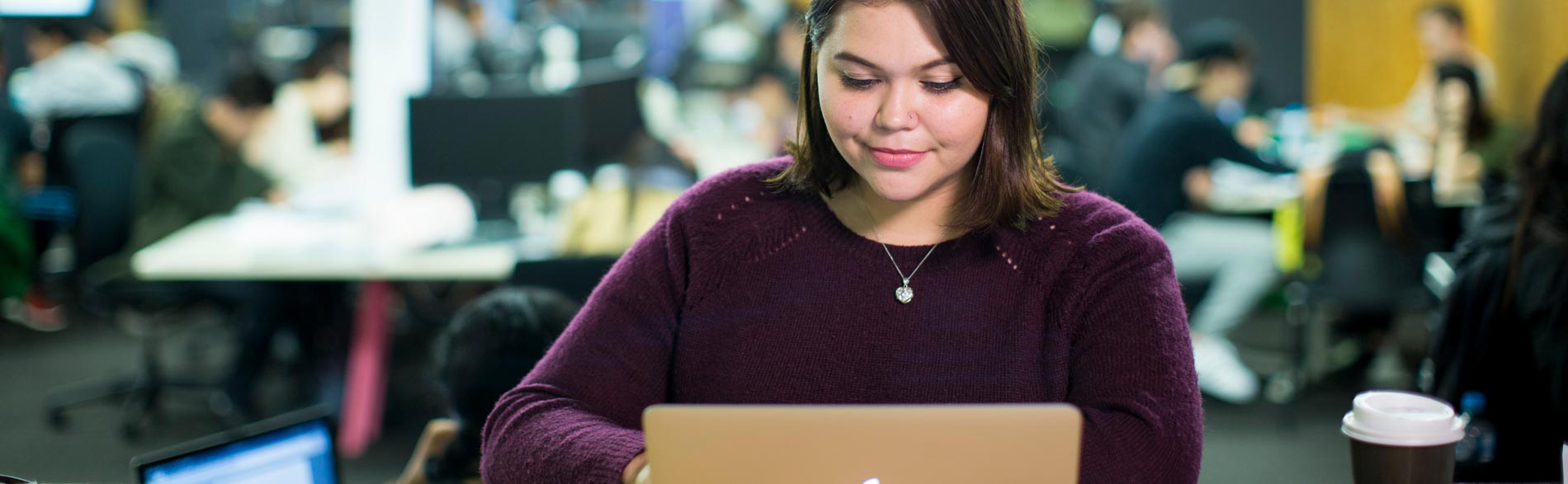 Young doctor using a laptop