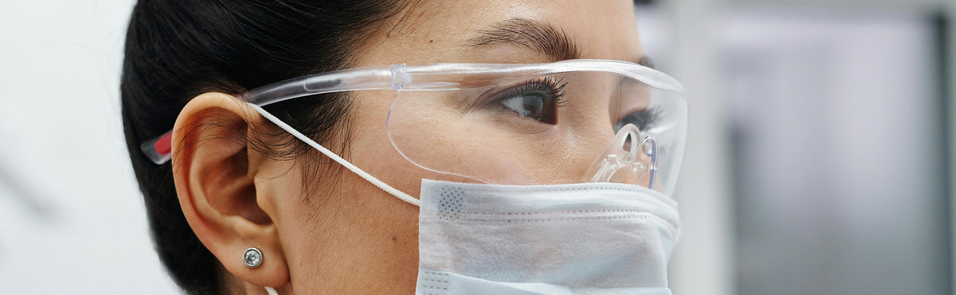 Closeup of a woman wearing personal protective equipment