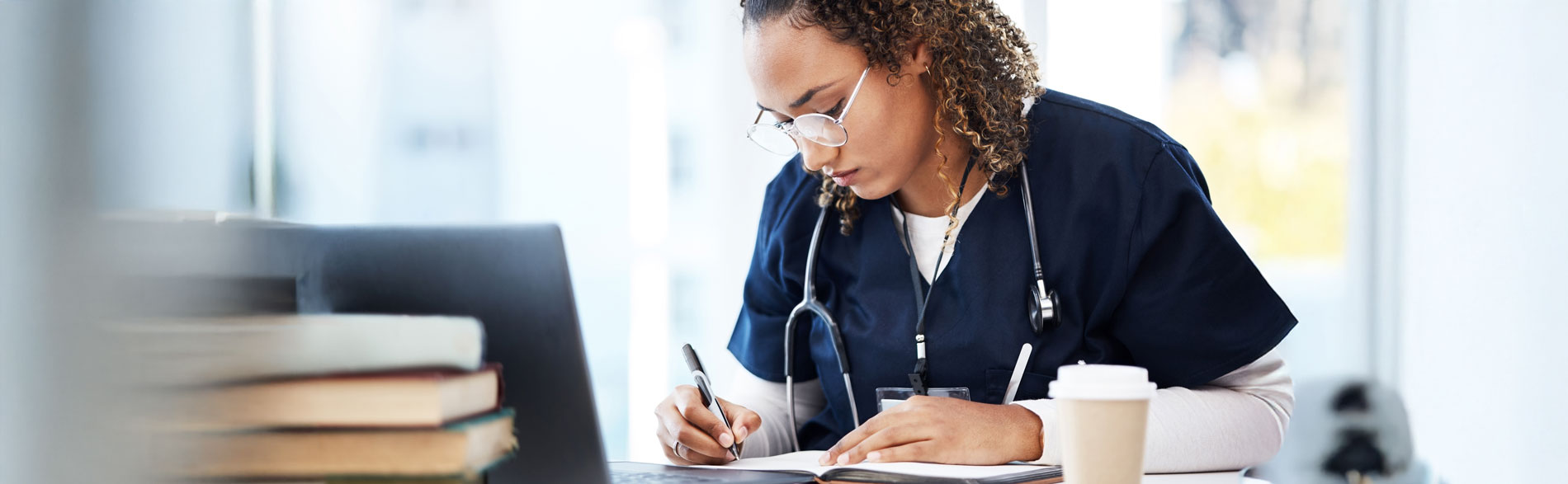 Nurse writing as part of a research project