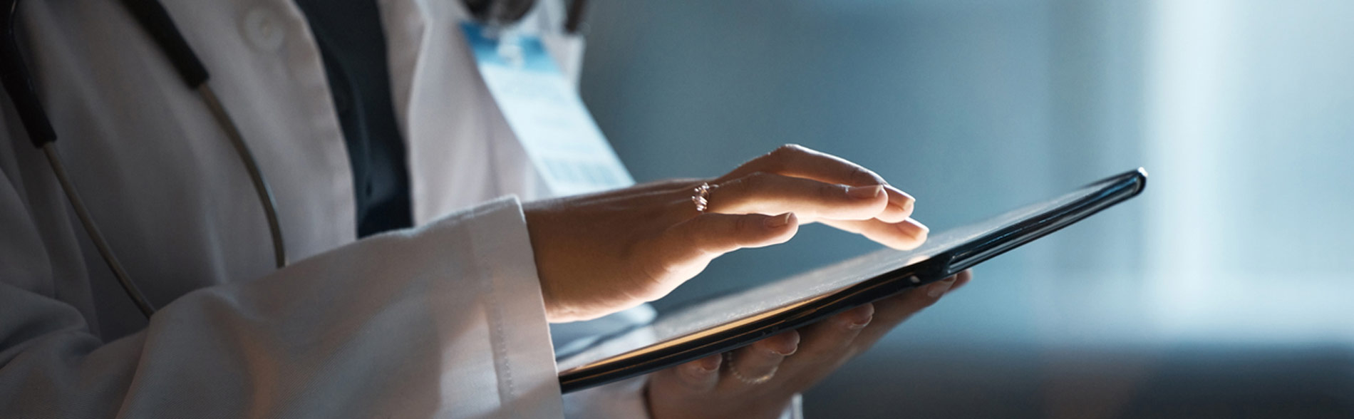 Clinician using e-tablet to grapple with implementation science's public relations problem