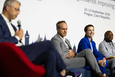 Dru Riddle and Jitka Klugarova with Promise and Holger at the Global Evidence Summit