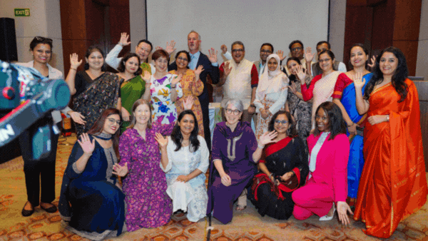 An animated GIF showing photos from the Australia Awards Fellowship Symposium and Graduation event
