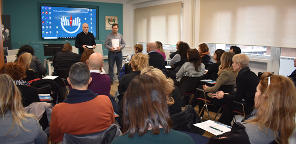 Clinicians attent a training session on PAI