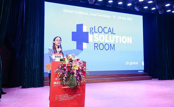 Yanni Wu speaks at a gLocal solution room event
