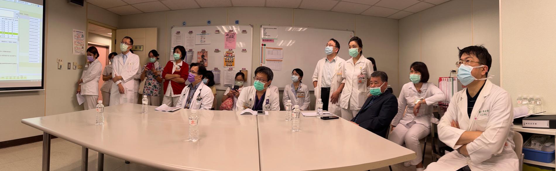 Clinicians watch a presentation about sleep care in breast cancer patients